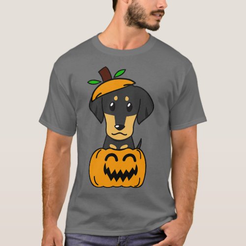 Funny dachshund is in a pumpkin T_Shirt