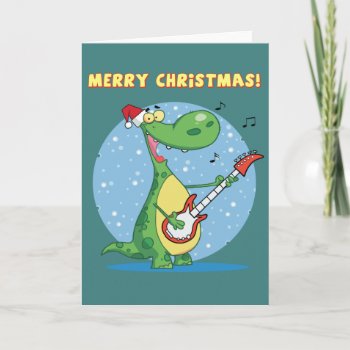 Funny Dinosaur Plays Guitar On Christmas Holiday Card by esoticastore at Zazzle