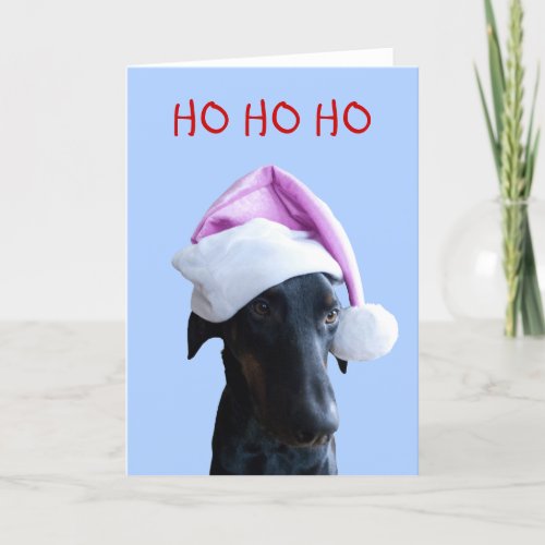 Funny dog with pink Santa Hat Christmas card