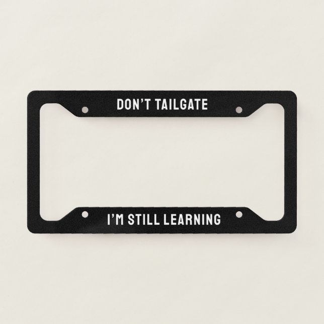 Funny “Don’t Tailgate, I’m Still Learning” License Plate Frame (Front)