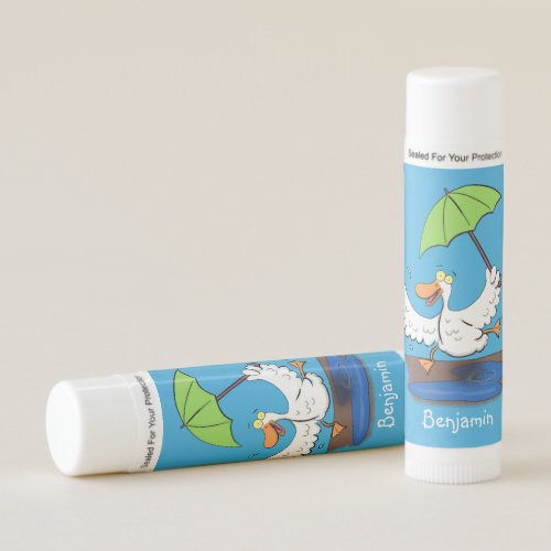 Funny duck with umbrella dancing cartoon lip balm