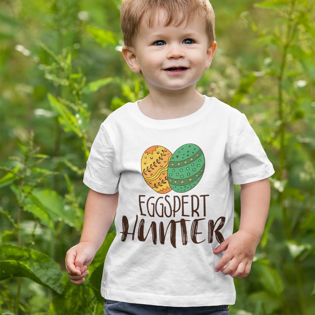 Funny Eggspert Hunter Easter Pun Saying Humorous Baby T-Shirt (Creator Uploaded)