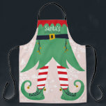 Funny elf suit illustration Santa's little helper Apron<br><div class="desc">Funny elf suit illustration Santa's little helper with a fun and cute green and red elf costume and big shoes with gold bells and white snow editable pastel pink background.</div>