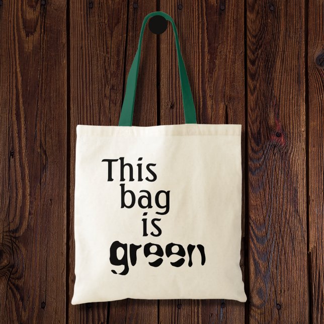 Funny environmental quotes humor pun reusable tote bag (This bag is green is a fun pun for the environmentally friendly person. A sustainable way to giggle.)