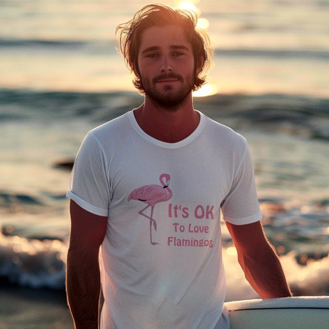 Funny Flamingo Lovers T-Shirt (handsome young adult male surfer wearing it's ok to love flamingos tee shirt)