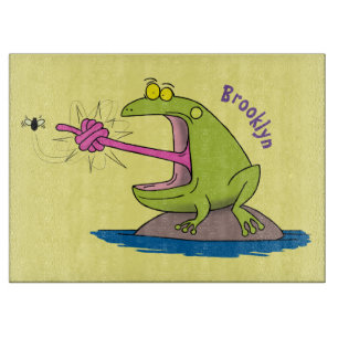 Funny frog and fly cartoon cutting board
