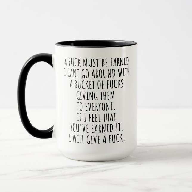 Funny Gag Gift inappropriate A F*ck Must Be Earned Mug (Left)