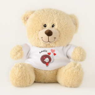 Funny girl with hearts balloons teddy bear
