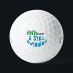 Funny Golf Balls 60th Birthday<br><div class="desc">Celebrate a golfer's 70th birthday in style with Funny Golf Balls 70th Birthday edition. These golf balls make a fun and unique gift for any golf enthusiast reaching this milestone age. With the playful inscription "70 years and still swinging!" these balls add a touch of humor and celebration to the...</div>