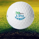 Funny Golf Balls 70th Birthday<br><div class="desc">Celebrate a golfer's 70th birthday in style with Funny Golf Balls 70th Birthday edition. These golf balls make a fun and unique gift for any golf enthusiast reaching this milestone age. With the playful inscription "70 years and still swinging!" these balls add a touch of humor and celebration to the...</div>