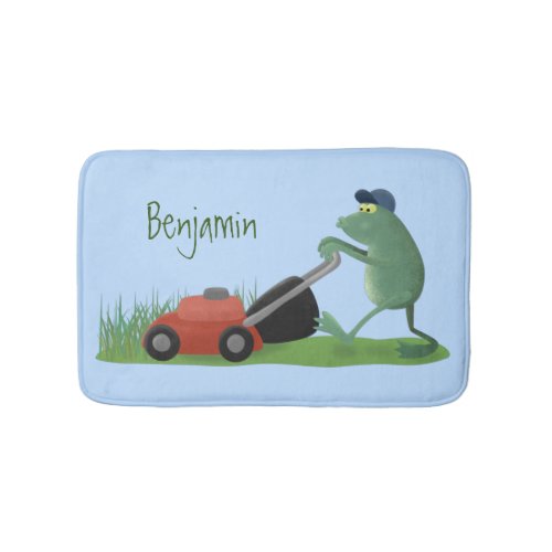 Funny green frog mowing lawn cartoon bath mat