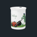 Funny green frog mowing lawn cartoon beverage pitcher<br><div class="desc">A funny green frog mowing the lawn in silly cartoon style.</div>