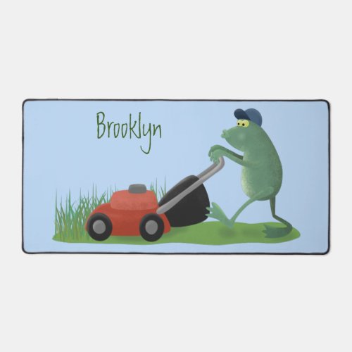 Funny green frog mowing lawn cartoon desk mat