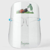 Funny green frog mowing lawn cartoon face shield (Front)