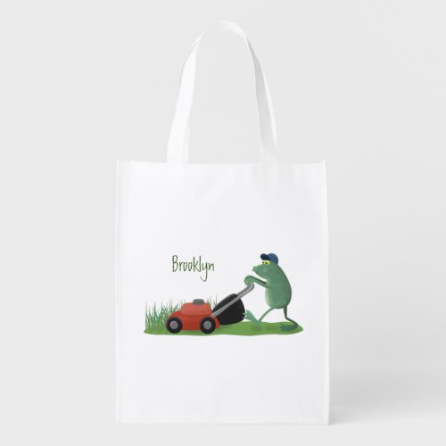 Funny green frog mowing lawn cartoon grocery bag