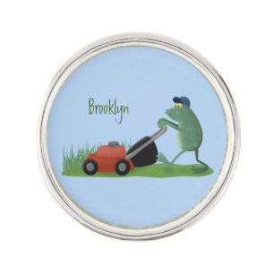 Funny green frog mowing lawn cartoon lapel pin
