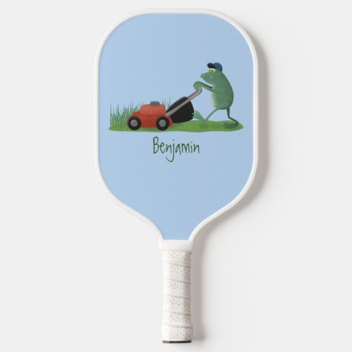 Funny green frog mowing lawn cartoon pickleball paddle
