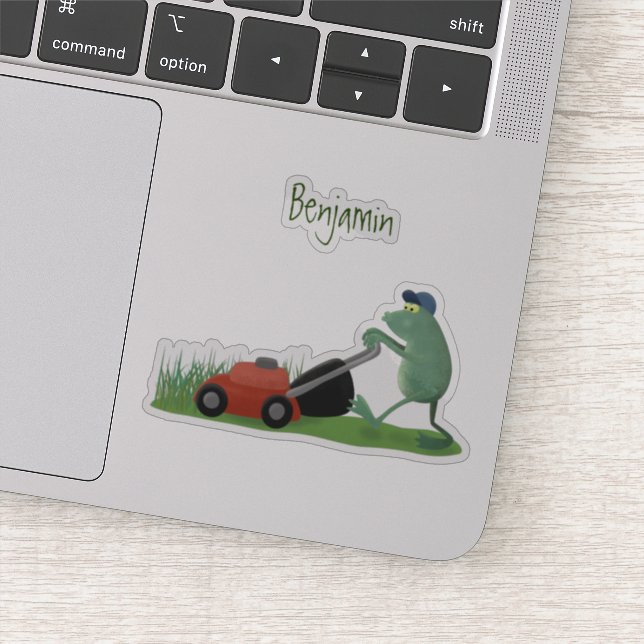 Funny green frog mowing lawn cartoon sticker (Detail)