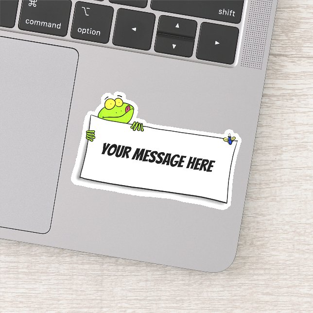 Funny green frog with sign cartoon sticker (Detail)