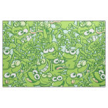 Funny green frogs entangled in a messy pattern fabric