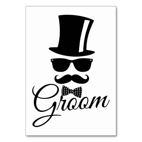 Funny groom  table number