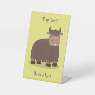 Funny happy yak eating grass cartoon illustration pedestal sign