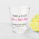 Funny Hot At 40 Birthday Shot Glass<br><div class="desc">Funny shot glasses for her 40th birthday part. "Take a shot she's still hot" is written in black typography and a hot pink script.</div>