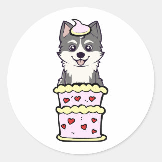 Funny husky jumping out of a cake classic round sticker