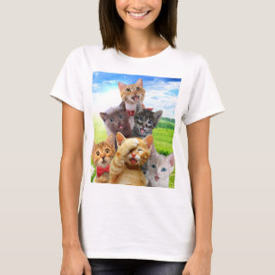 Funny kittens in green field. T-Shirt