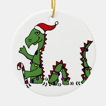 Funny Loch Ness Monster In Santa Hat Christmas Ceramic Ornament by patcallum at Zazzle