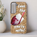 Funny Love The Wine You're With Message Samsung Galaxy S22 Case<br><div class="desc">With a cork background and a glass of red wine in pouring action this phone case makes a fun gift idea for the wine lover.  Personalize or remove the text,  or edit using the design tool to select a font style,  size and color you like.</div>