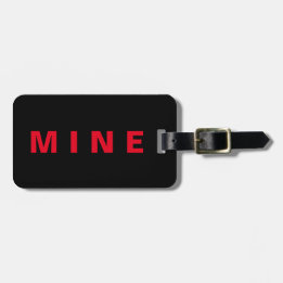 Funny luggage tag with 'Mine' written on it