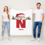 Funny Monogram Family Christmas Custom Red Santa Fleece Blanket<br><div class="desc">Elevate your family's Christmas celebrations with our Funny Monogram Family Christmas Custom Red Santa Fleece Blanket. This personalized fleece blanket is a perfect addition to your holiday decor and can also make a great gift for family members. Customize this blanket with your family's names to create a unique keepsake that's...</div>