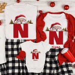 Funny Monogram Family Christmas Custom Red Santa T-Shirt<br><div class="desc">Add some jolly humor and a personalized touch to your family's holiday celebrations with our Funny Monogram Family Christmas Custom Red Santa T-Shirt. This fun and festive shirt is perfect for families looking to create memorable Christmas moments. Our monogrammed family Christmas shirt allows you to customize it with your family...</div>