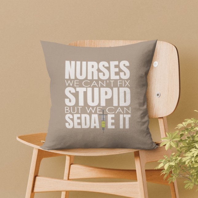 Funny Nurse We Can't Fit Stupid Throw Pillow (Nurses can’t fix stupid, but we can sedate it – a perfect touch of humor for your home decor.)