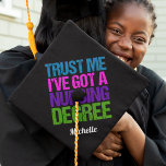 Funny Nursing School Graduation Cute Nurse Graduation Cap Topper<br><div class="desc">Trust Me,  I've got a nursing degree. A cute and funny nurse graduation cap topper for a nursing school graduate who is becoming an RN or LPN. Customize with your name.</div>