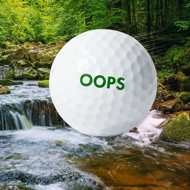 Funny 'Oops' Humor Joke Quirky Novelty Golf Balls (A funny novelty golf ball with 'Oops' caption in green on a classic white background)