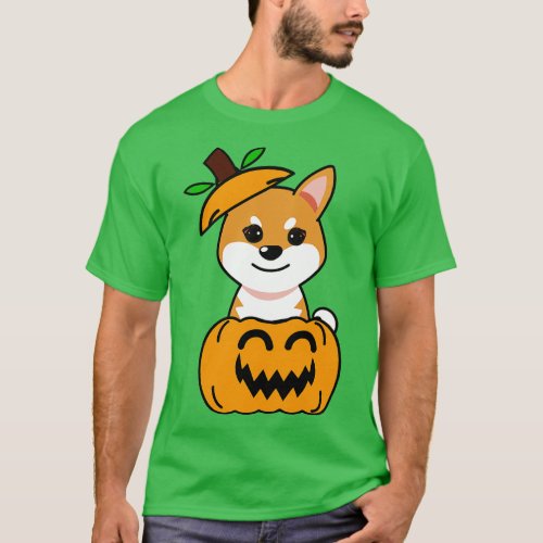 Funny orange dog is in a pumpkin T_Shirt