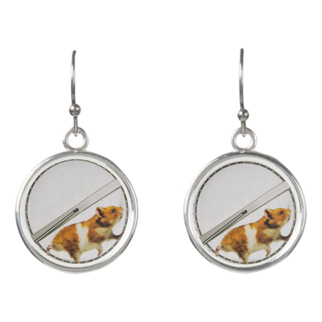 Funny orange hamster stuck running inside earrings (Front)