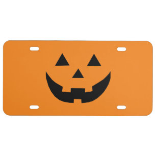 Funny orange Jack o lantern pumpkin face Halloween License Plate