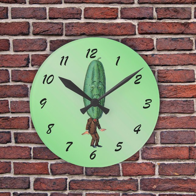 Funny Pickle Head Man Wearing Suit Round Clock (Fun man in suit with big green pickle head with a face on a light green round wall clock.)