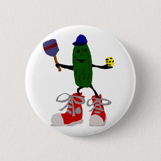 Funny Pickle Holding Pickleball and Paddle Button (Front)