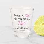 Funny Pink 40th Birthday Party Favor Shot Glass<br><div class="desc">Funny pink and black "Take a Shot She's Still Hot" 40th birthday party favor shot glass. Personalize with her name,  age and the party date.</div>