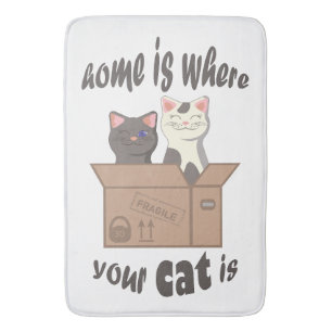 Funny quote Home is where your cat is Bath Mat
