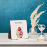Funny Quote on Happiness with a Cupcake Image Plaque<br><div class="desc">A funny photo plaque with a funny quote which says: Happiness is only a cupcake away. An image with a yummy illustration featuring a delicious looking cupcake. White cream and a big strawberry adorn this yummy sweet treat.</div>