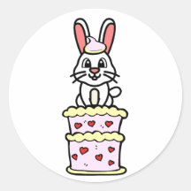 Funny Rabbit jumping out of a cake