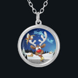 Funny Reindeer Peeking Christmas Meme  Silver Plated Necklace<br><div class="desc">A Funny cartoon reindeer with a bright red nose and large white antlers, adorned with a red and gold bow, peeks through an open window. Outside, a snowy landscape with silhouetted pine trees and a small, glowing house is visible under a dark blue, star-filled night sky. Santa's sleigh pulled by...</div>