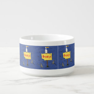 Funny sea bird circled by sharks cartoon bowl