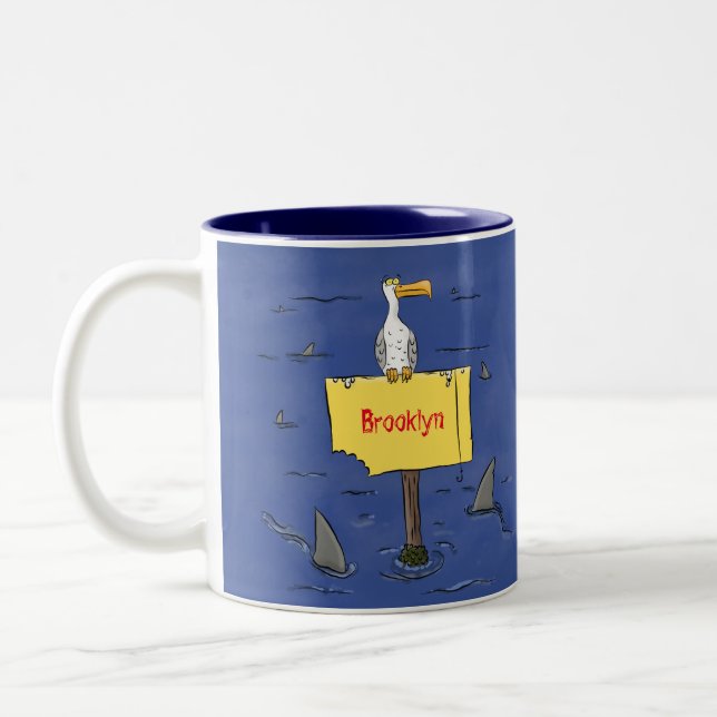 Funny sea bird circled by sharks cartoon Two-Tone coffee mug (Left)