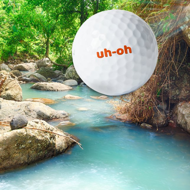 Funny Simple 'uh-oh' Golfing Humor Novelty Golf Balls (A humorous golf ball with 'uh-oh' slogan in orange on classic white)